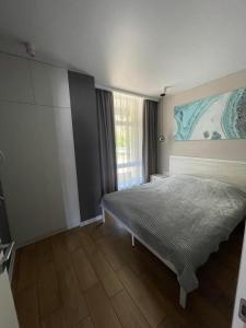 Cama o camas de una habitación en Золотой Бугаз, Колоски, апартамент 7/1