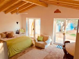 Ένα ή περισσότερα κρεβάτια σε δωμάτιο στο Casa De Mondo