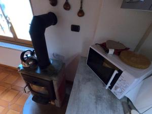 Kuchyň nebo kuchyňský kout v ubytování Casa Aurora -Altopiano di Pinè