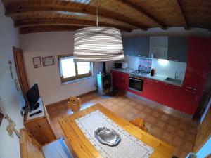 Kuchyň nebo kuchyňský kout v ubytování Casa Aurora -Altopiano di Pinè