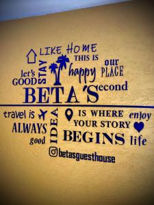 a picture of a sign that says like how we are happy place be a second at BetaS GuestHouse in Antalya