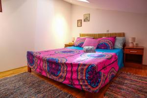 Кровать или кровати в номере Amu Apartment