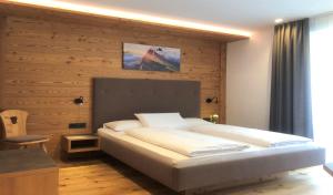 Postel nebo postele na pokoji v ubytování B&B Obermair