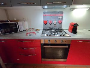 A kitchen or kitchenette at Casa Aurora -Altopiano di Pinè Még 25 kép