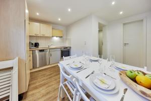 Kuchyň nebo kuchyňský kout v ubytování Wohnung 11 - nur 10 Minuten zu Fuß in den Europa-Park + 15 fotografií