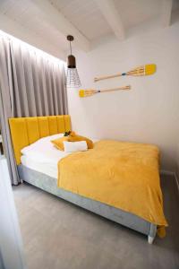 Postel nebo postele na pokoji v ubytování DOMKI ZACISZE Chmielno Kaszuby - nowe i wyjątkowe cottage - spokój