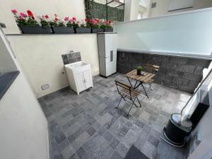 A seating area at Suite Catania Lungomare