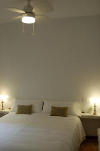 A bed or beds in a room at La Casa de Zamora