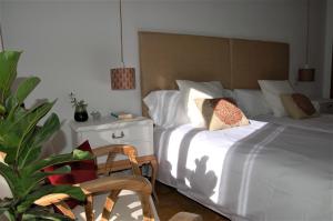 A bed or beds in a room at La Casa de Zamora