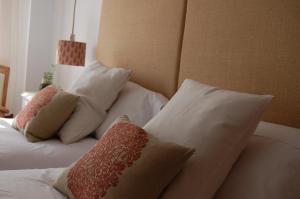 A bed or beds in a room at La Casa de Zamora