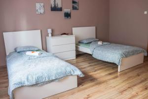Katil atau katil-katil dalam bilik di Forest Luxury Apartman
