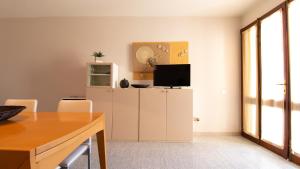 TV a/nebo společenská místnost v ubytování Casa Corbezzolo