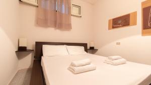 Postel nebo postele na pokoji v ubytování Casa Corbezzolo