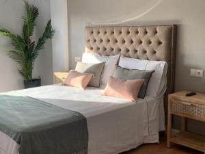 Posteľ alebo postele v izbe v ubytovaní MILLADOIRO BELLA BOUTIQUE