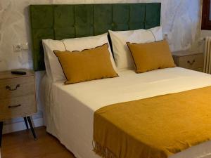 Posteľ alebo postele v izbe v ubytovaní MILLADOIRO BELLA BOUTIQUE