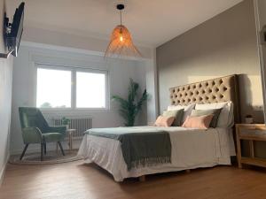 Posteľ alebo postele v izbe v ubytovaní MILLADOIRO BELLA BOUTIQUE
