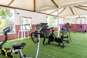 a gym with several exercise bikes in a tent at Hotel D'Amato in Peschici