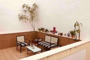 Posezení v ubytování “SMILE NERJA” chic apartment with WIFI, 4 guests