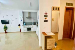 Kuchyň nebo kuchyňský kout v ubytování “SMILE NERJA” chic apartment with WIFI, 4 guests