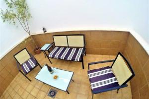 Posezení v ubytování “SMILE NERJA” chic apartment with WIFI, 4 guests