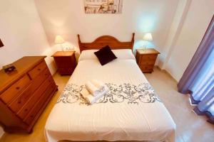 Postel nebo postele na pokoji v ubytování “SMILE NERJA” chic apartment with WIFI, 4 guests