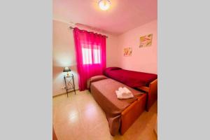 Postel nebo postele na pokoji v ubytování “SMILE NERJA” chic apartment with WIFI, 4 guests