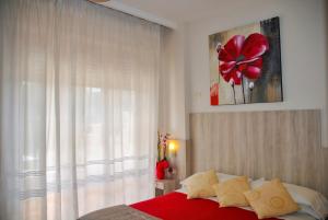 Кровать или кровати в номере Hotel Villa Fiorita
