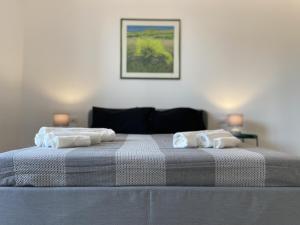 Postel nebo postele na pokoji v ubytování Cutapp Guest House