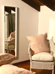 Rúm í herbergi á Enjoy Ledro B&B
