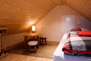 Ένα ή περισσότερα κρεβάτια σε δωμάτιο στο Ferienhaus Waldblick