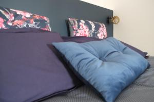 Кровать или кровати в номере A l'ombre des remparts