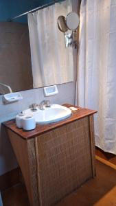 Kylpyhuone majoituspaikassa Antigal