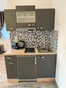 Η κουζίνα ή μικρή κουζίνα στο Nici´s Appartements
