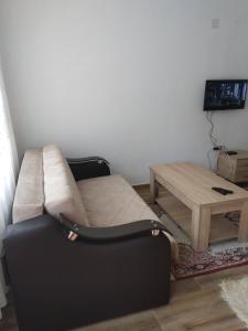 Un pat sau paturi într-o cameră la Apartmani Tara i Zabojsko Dobrilovina