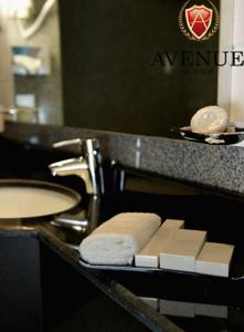 A bathroom at The Avenue Suites
