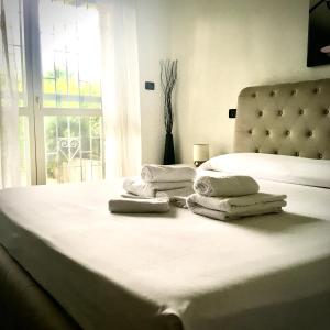 Кровать или кровати в номере Residenza stadio