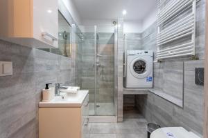 Een badkamer bij Ambria Apartments Flotylla