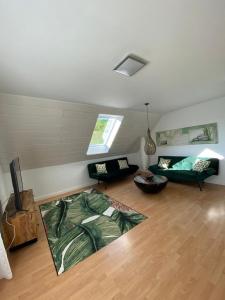 Postel nebo postele na pokoji v ubytování Boardinghouse Saargau