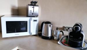 A kitchen or kitchenette at Holiday Home Cannubi in Barolo