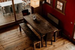 a wooden table and a chair in a room at Chalet Marie Blanche in Saint-Gervais-les-Bains +31 photos