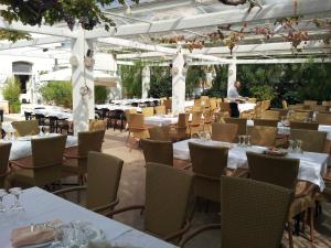 Hotel Vecchio Mulino餐厅或其他用餐的地方