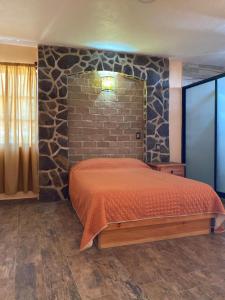 Posteľ alebo postele v izbe v ubytovaní Hotel Spa el Gran Coral By Rotamundos