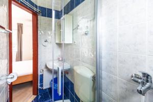 Kúpeľňa v ubytovaní Apartments & Rooms Strčić Petra