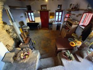 an overhead view of a kitchen and a living room at Katerina's Sunset in Panormos +31 photos