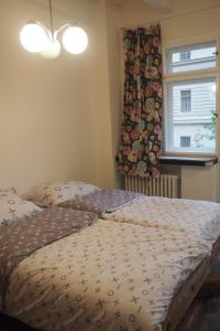Postel nebo postele na pokoji v ubytování Rodinný apartmán v centru Prahy