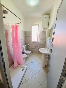 Phòng tắm tại Vila Hotel