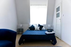 Posteľ alebo postele v izbe v ubytovaní Blue Marina Gdańsk
