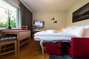 Televiisor ja/või meelelahutuskeskus majutusasutuses Atempause