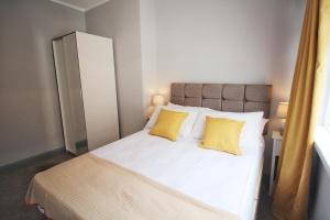 Postel nebo postele na pokoji v ubytování Anjore House - Modern House in Belfast City