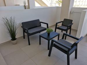 Posedenie v ubytovaní White Suite Deluxe
